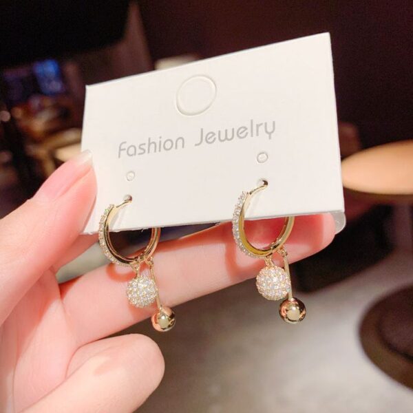 Dainty Diamond Dangle Earrings - Image 3